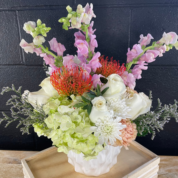 Flower Stems in a White Color Vase